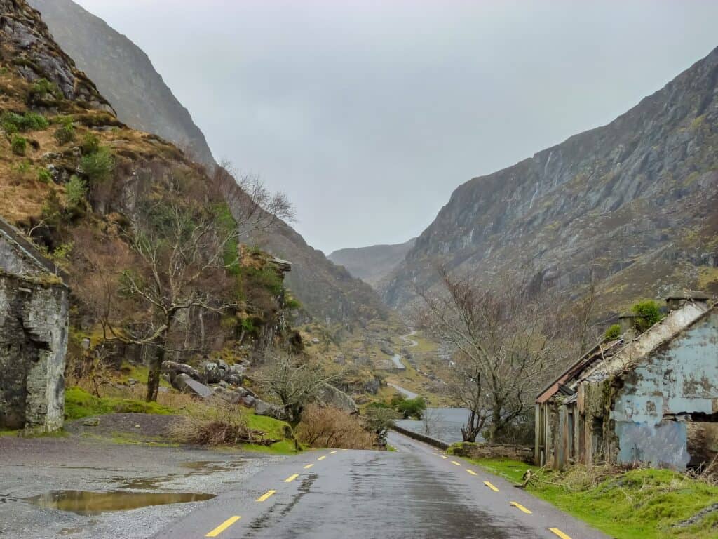Scenic view of Kerry valley with mountains and a winding road.