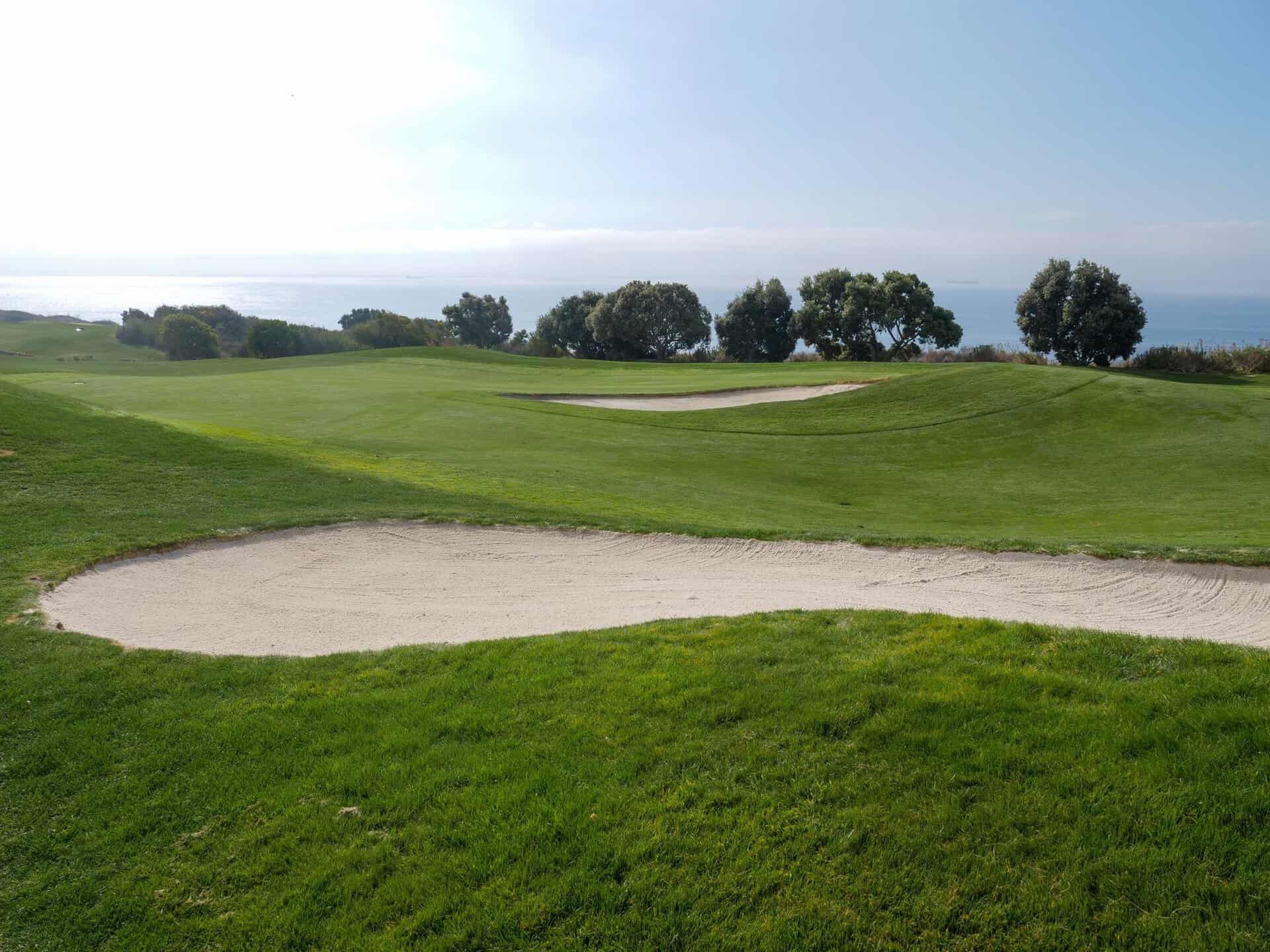 Golf fairway with a bunker