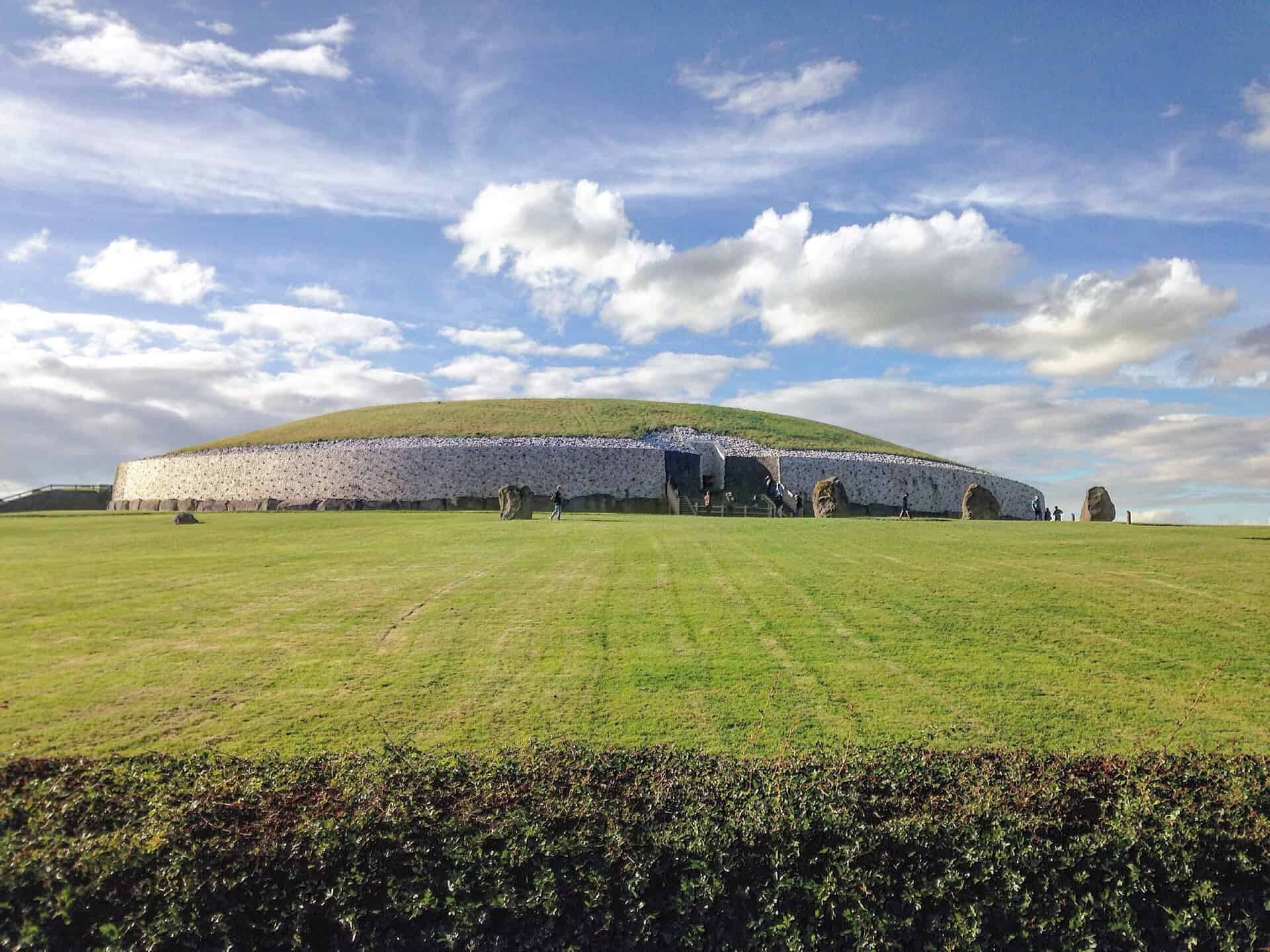 The reconstructed frontage and grassy mound at Newgrange in County Meath.