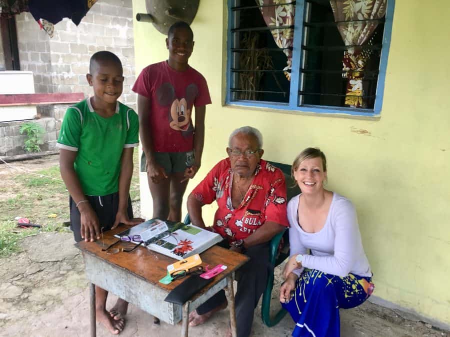 Donating reading glasses in Lavena Island Spirit Fiji