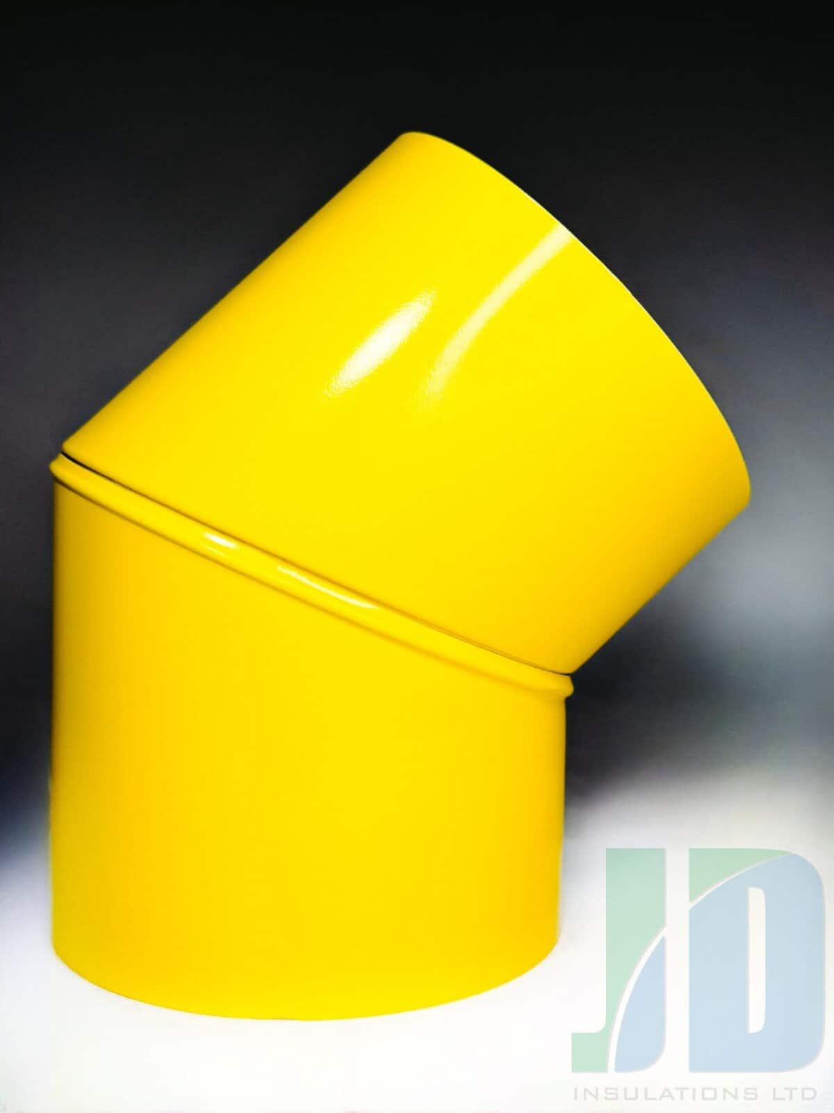 Yellow pipe elbow joint, glossy surface.