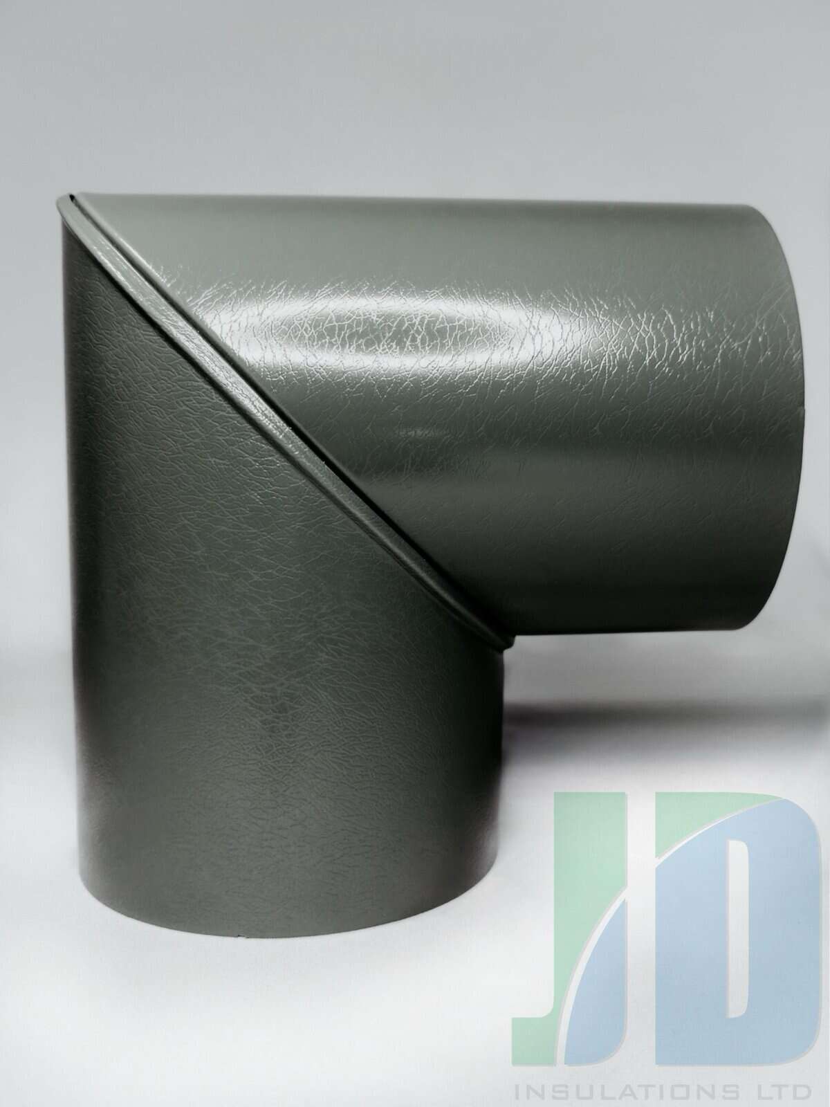 Grey insulated pipe corner with company logo.