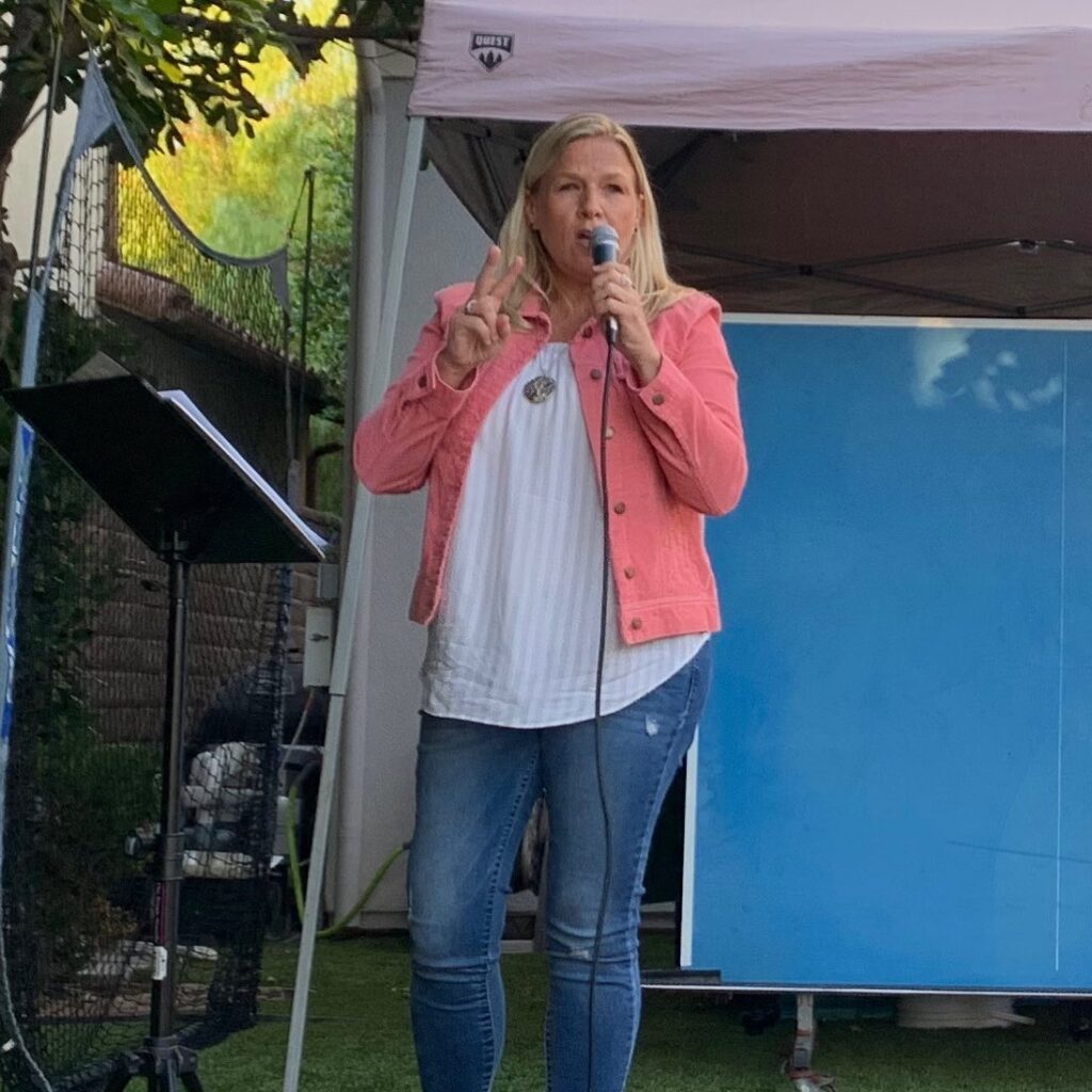 Jodi speaking to a group