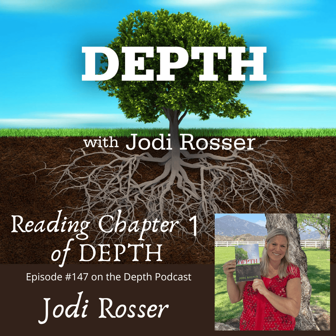Jodi Rosser reading from her book under a tree.