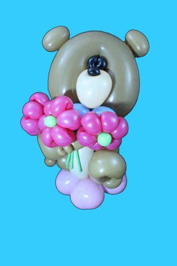 Cute bear with flowers