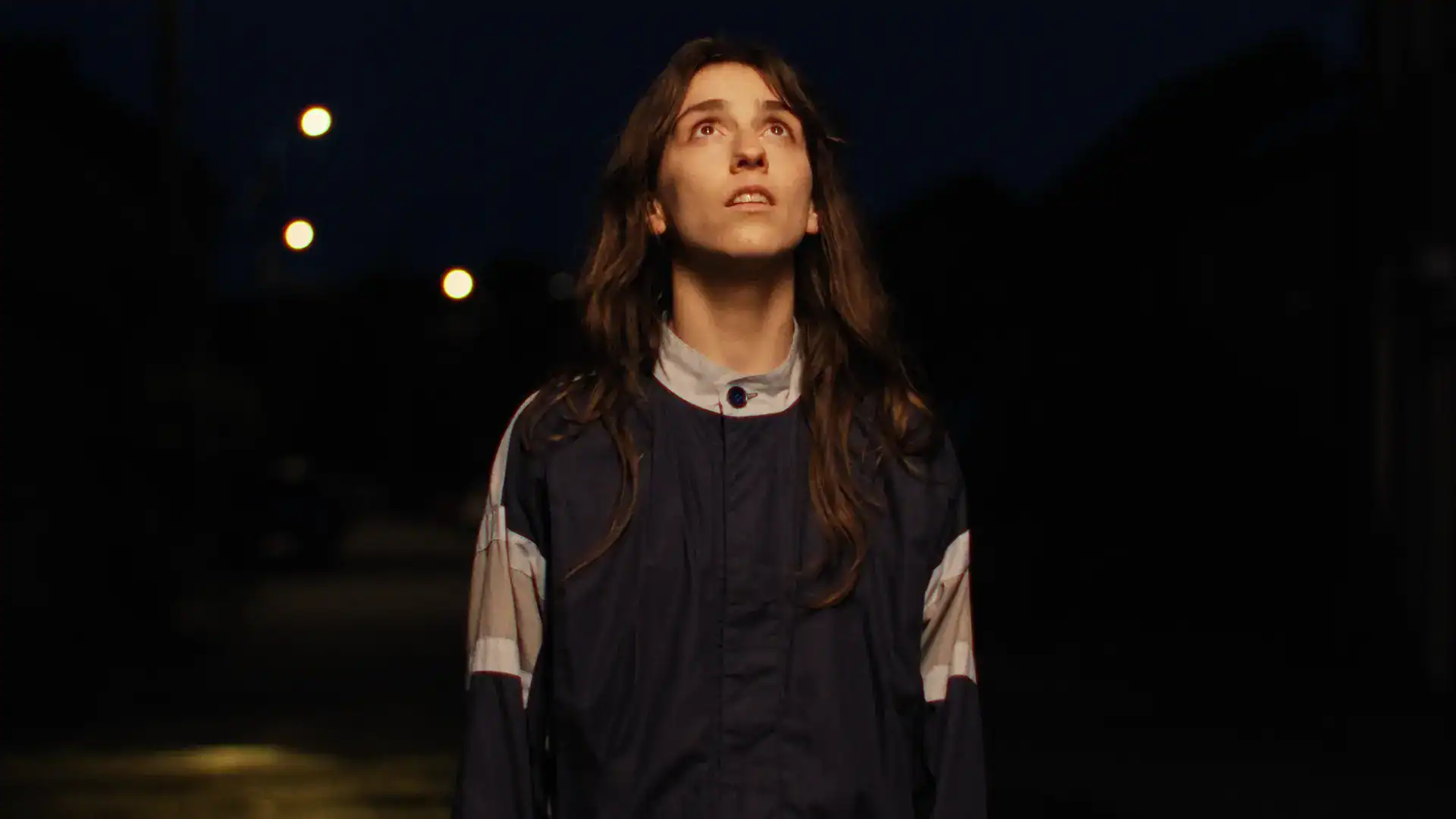 Keplerfilm Night Scene with Woman Looking Up at Night.