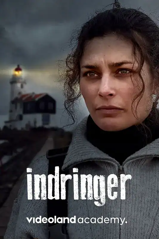 Woman near lighthouse during stormy weather, dramatic scene at the coast.