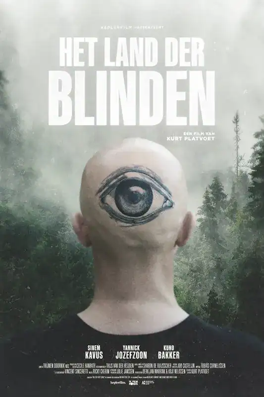 Movie poster for "The Land of the Blind" featuring a person with an eye on their face, forest backgr.