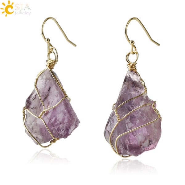 Natural Stone wire wrapped earrings featuring raw purple natural stones with a gold wire wrap and simple gold hooks. The stones have an unpolished, organic look.