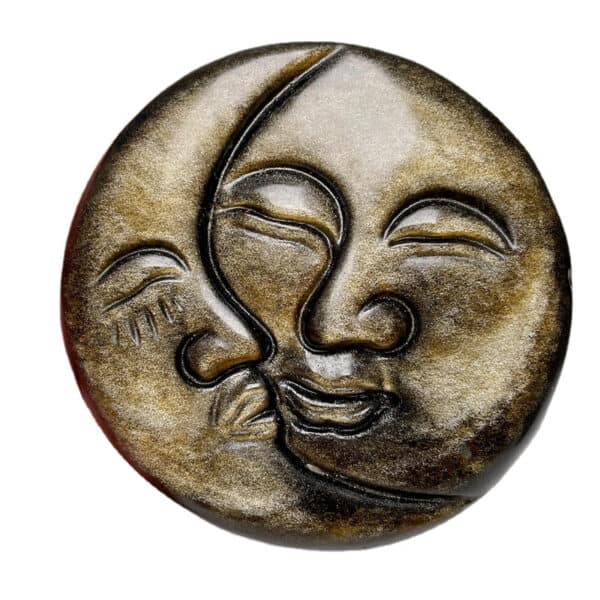 A Natural Golden/Silver Obsidian Carved Sun & Moon sculpture with two abstract faces in close embrace, featuring smooth, flowing lines and a bronze-like finish inspired by Golden Obsidian.