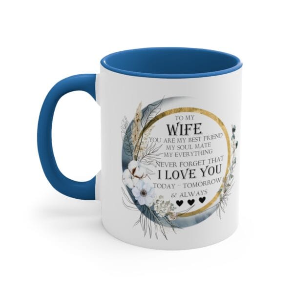 The To My Wife / Girlfriend Mug is a white mug with a blue handle and interior, decorated with a floral wreath and heartfelt text to express love and appreciation for your wife.