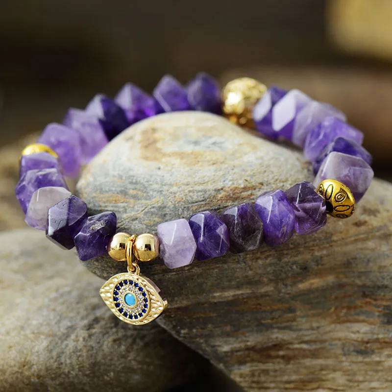 Amethyst stone bracelet with gold plated evil eye charm