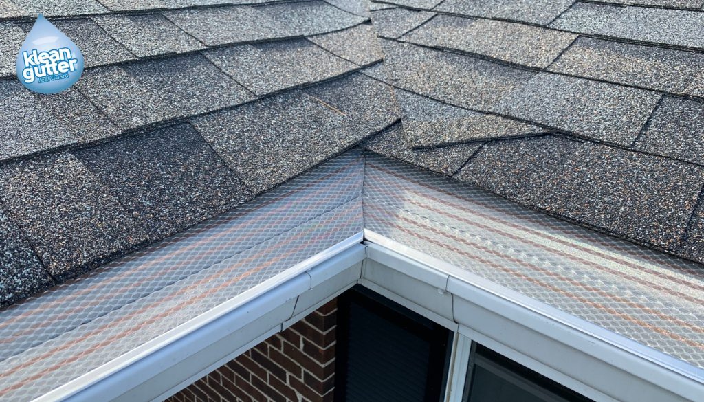 Close-up of Klean Gutter installed cleanly at roof pitch along a residential roofline.