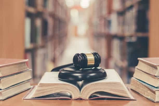 a gavel on top of a book