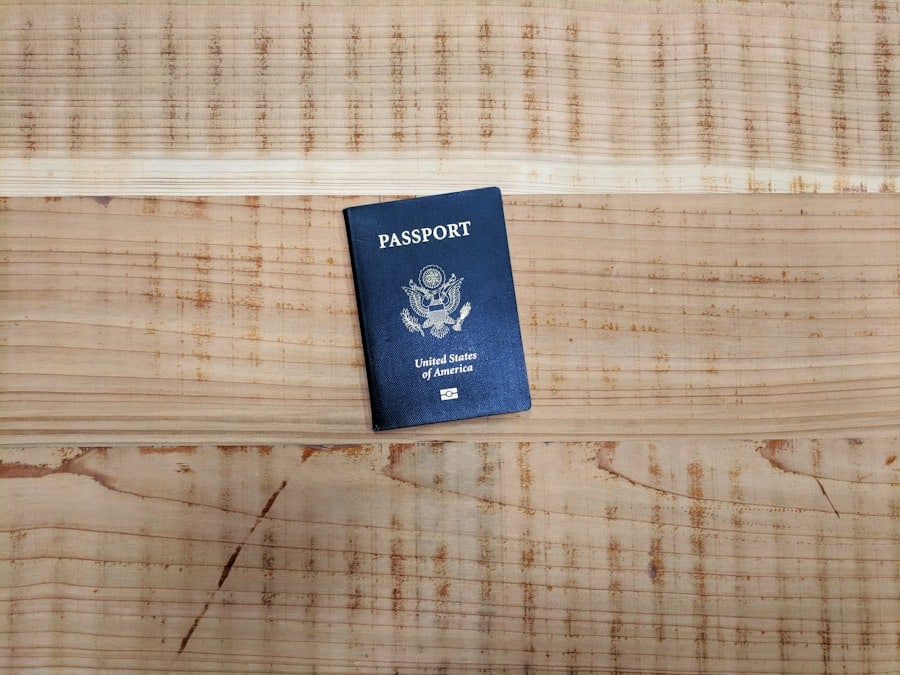 abcdhe 28 a blue passport on a wooden surface