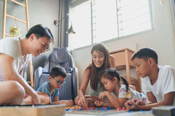 husband and wife explaining family law practice to their children