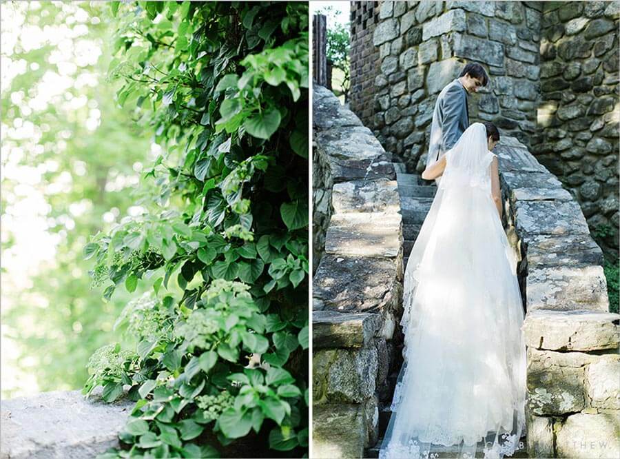 Bride and groom walking up a stone staircase in the venue’s garden setting.