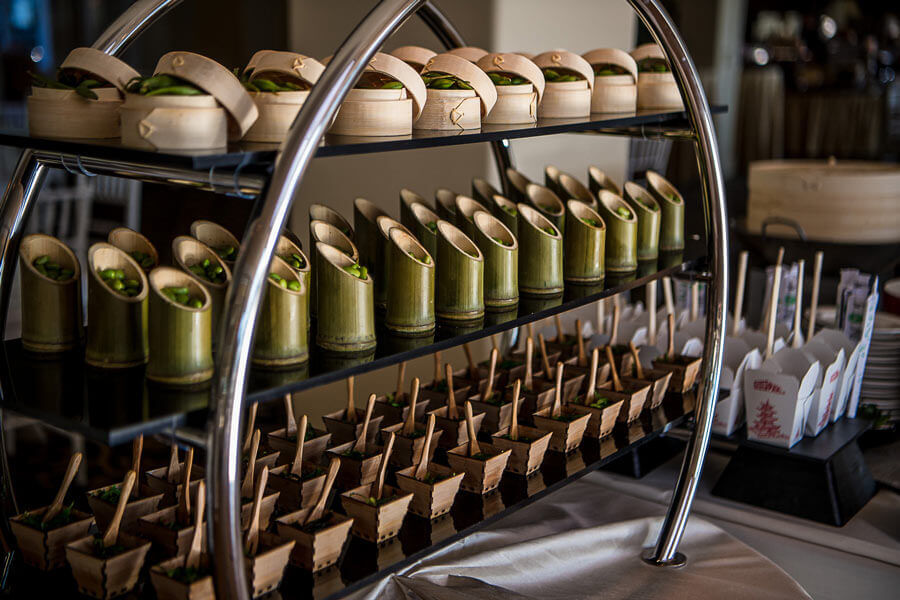 Asian-inspired appetizer station with elegant plated bites at Le Chateau Banquets