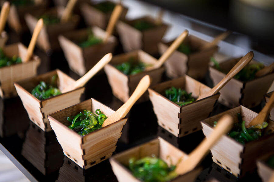 Asian-inspired appetizer cups with seaweed salad at Le Chateau Banquets reception station