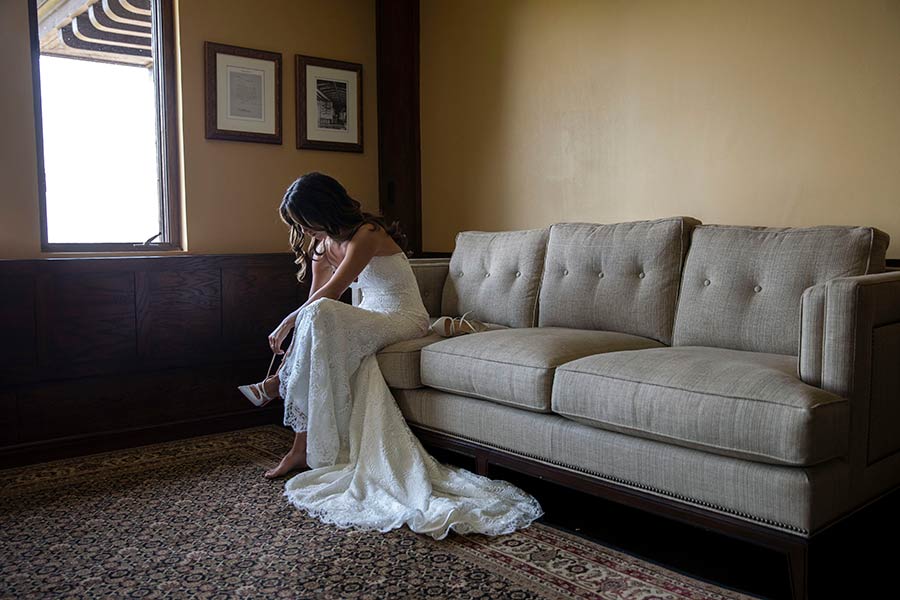 Bride preparing for her wedding day in a private suite at Le Chateau Banquets
