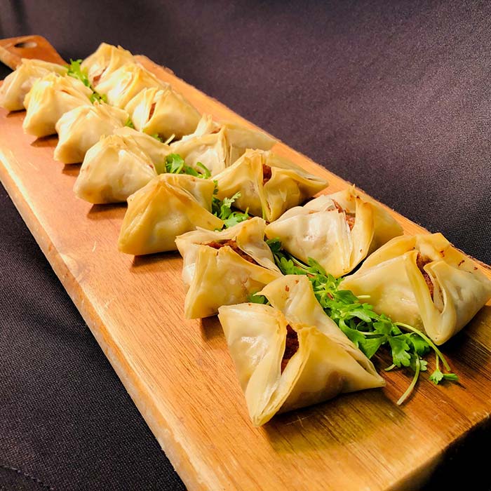 Quince and manchego phyllo stars with toasted almonds served as elegant event appetizers