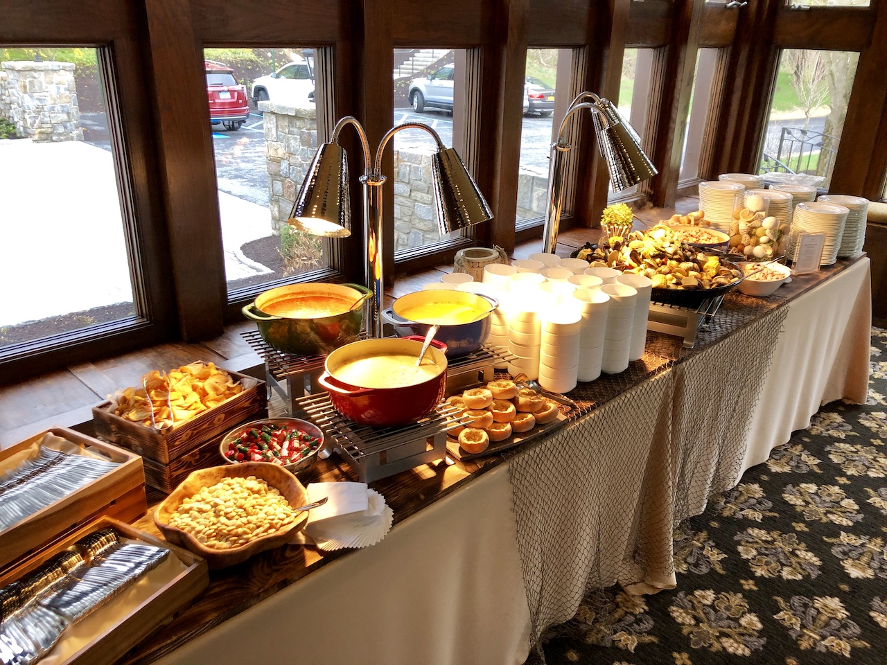 New England buffet station with warm soups and seasonal appetizers for event guests.