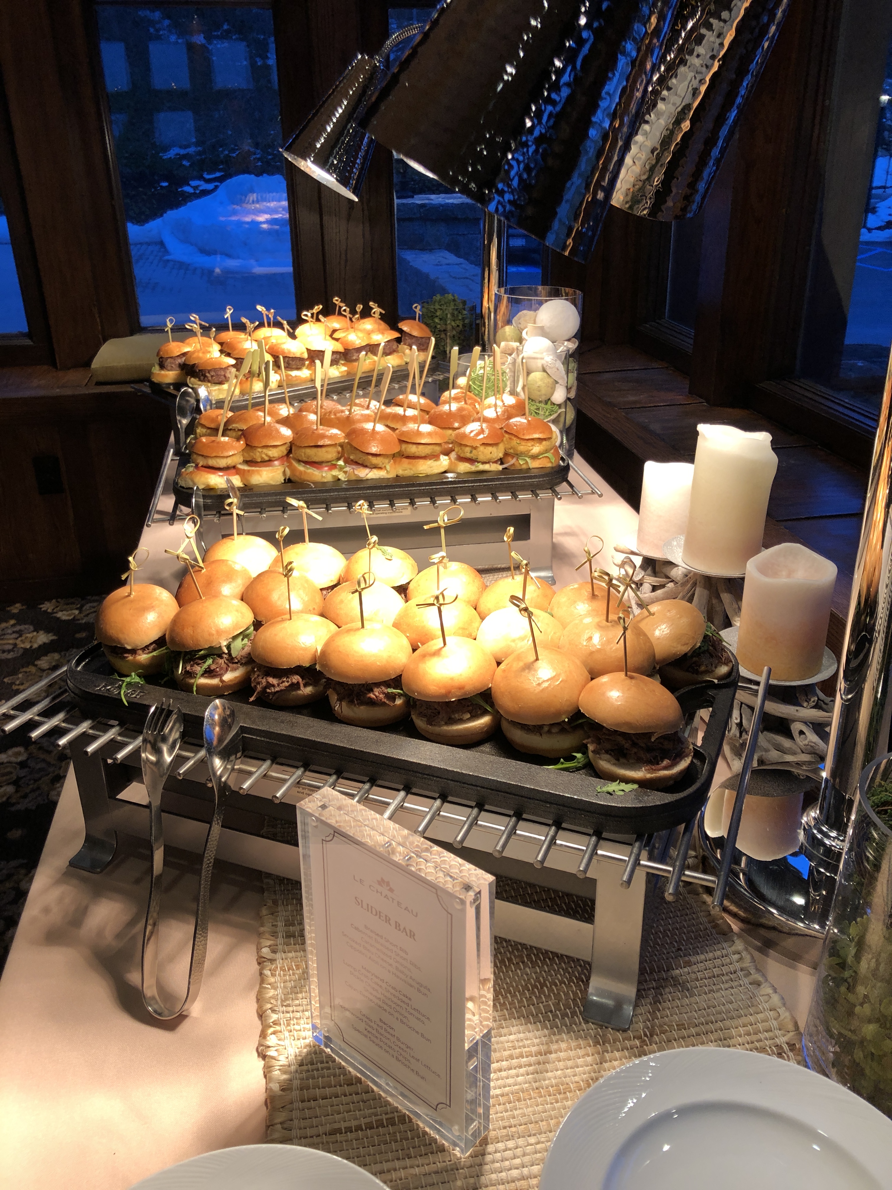 Premade slider bar featuring gourmet mini sandwiches for cocktail hour receptions.