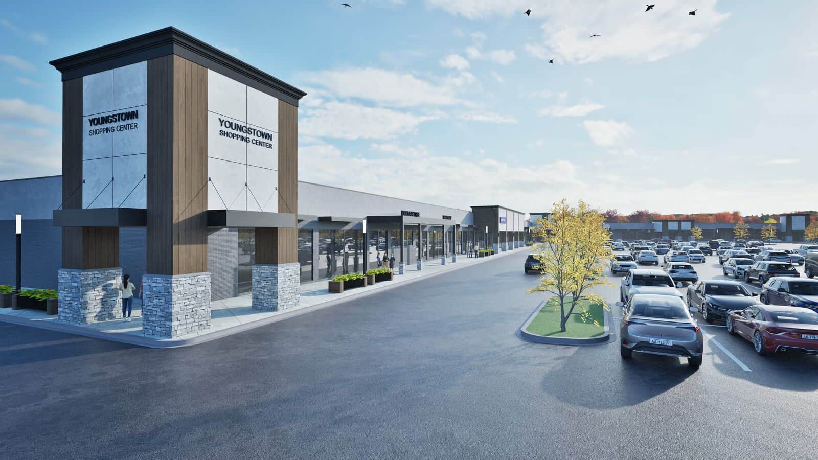 New shopping center in Jeffersonville, IN, with modern design, large parking lot, and clear signage for Youngstown Shopping Center.