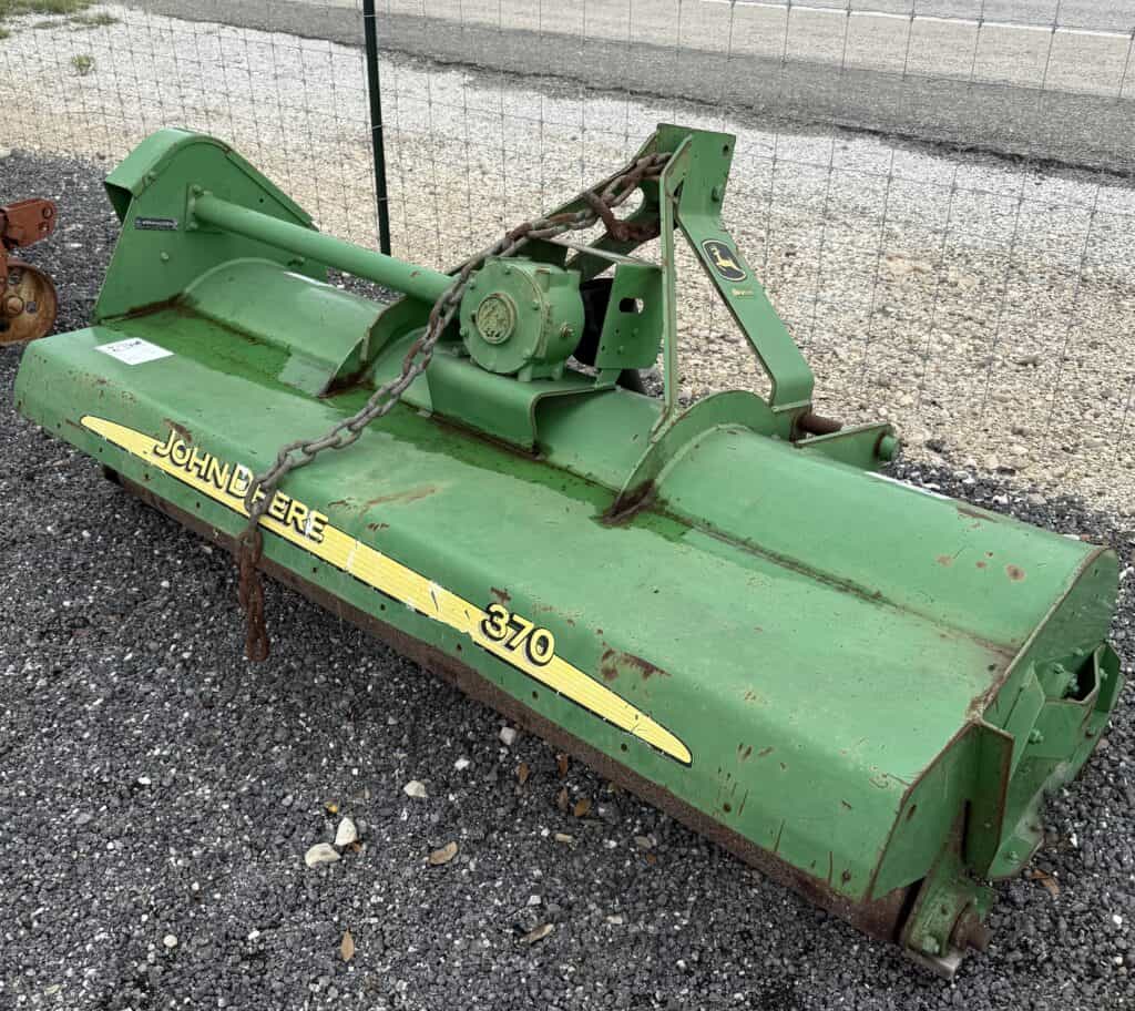 Green John Deere 370 rotary cutter for sale at June 6th consignment auction.