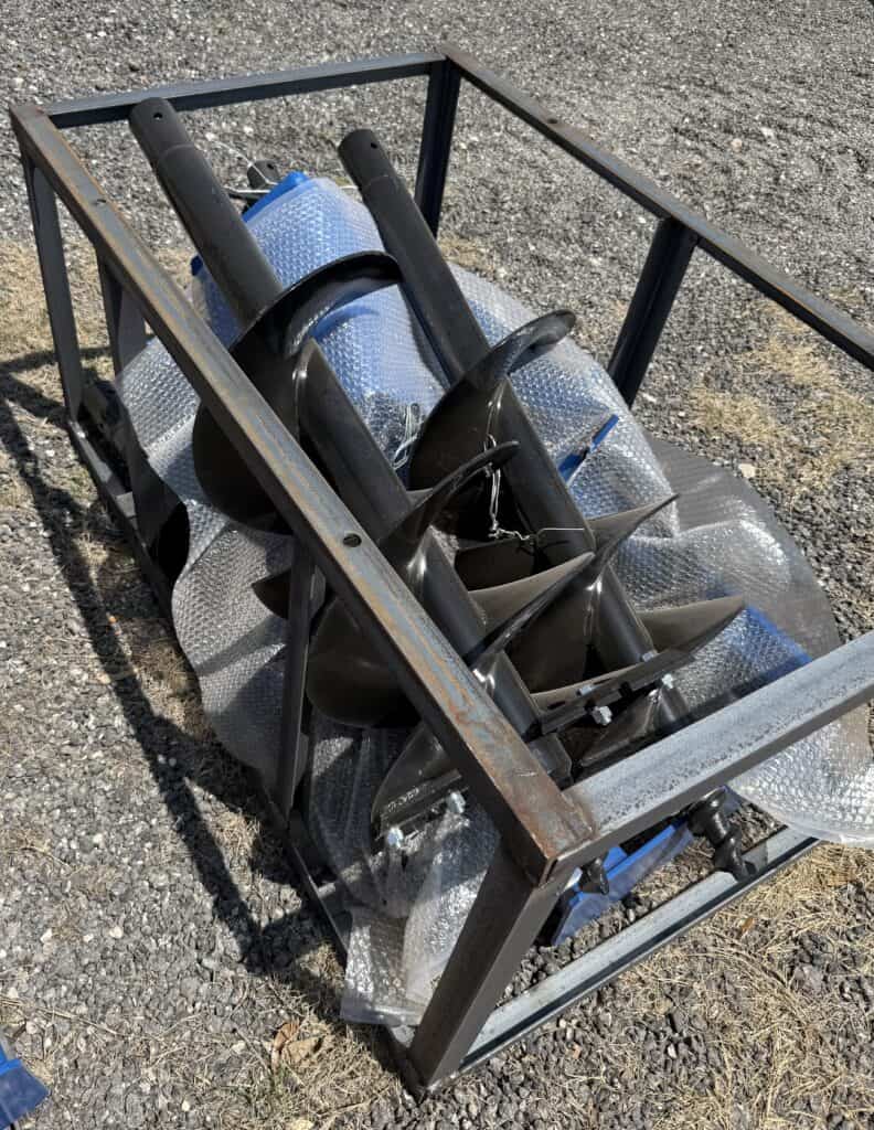 Industrial equipment cart with black handles and wheels, used for transporting heavy tools and machi.