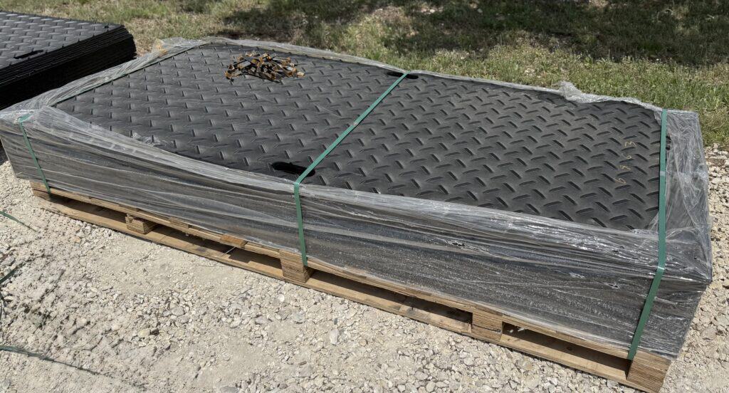 Garage door panels for sale at Garrett Realty & Auction.