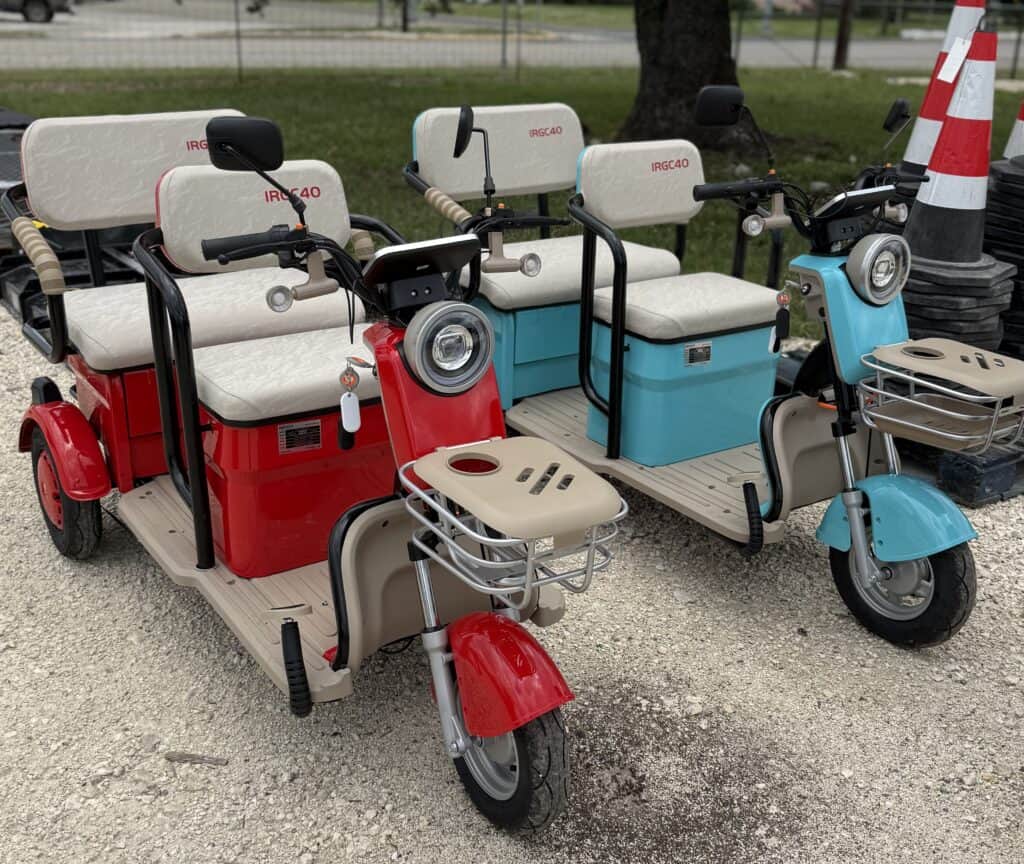 Golf cart fleet for Garrett Realty & Auction, featuring multiple electric carts for easy outdoor tra.