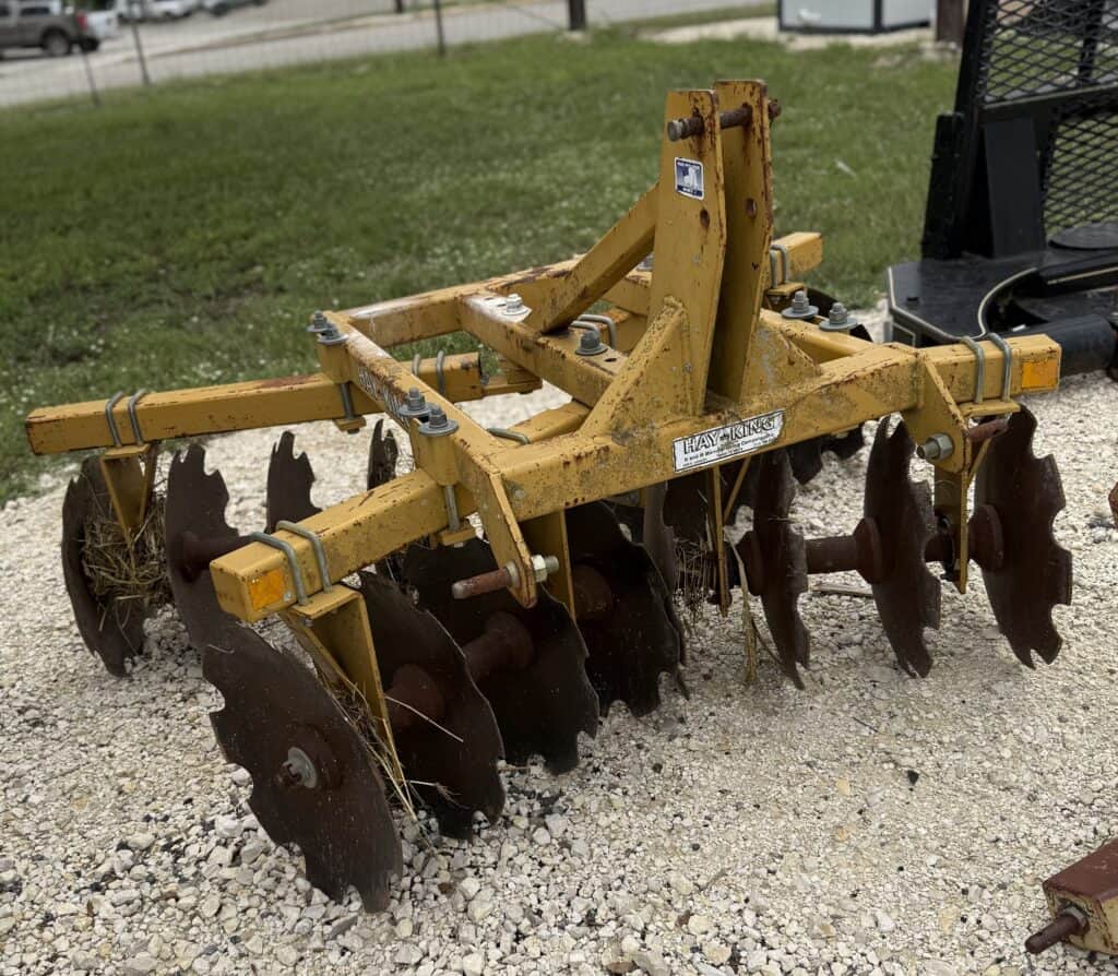 Disc harrow for soil preparation and agricultural use.