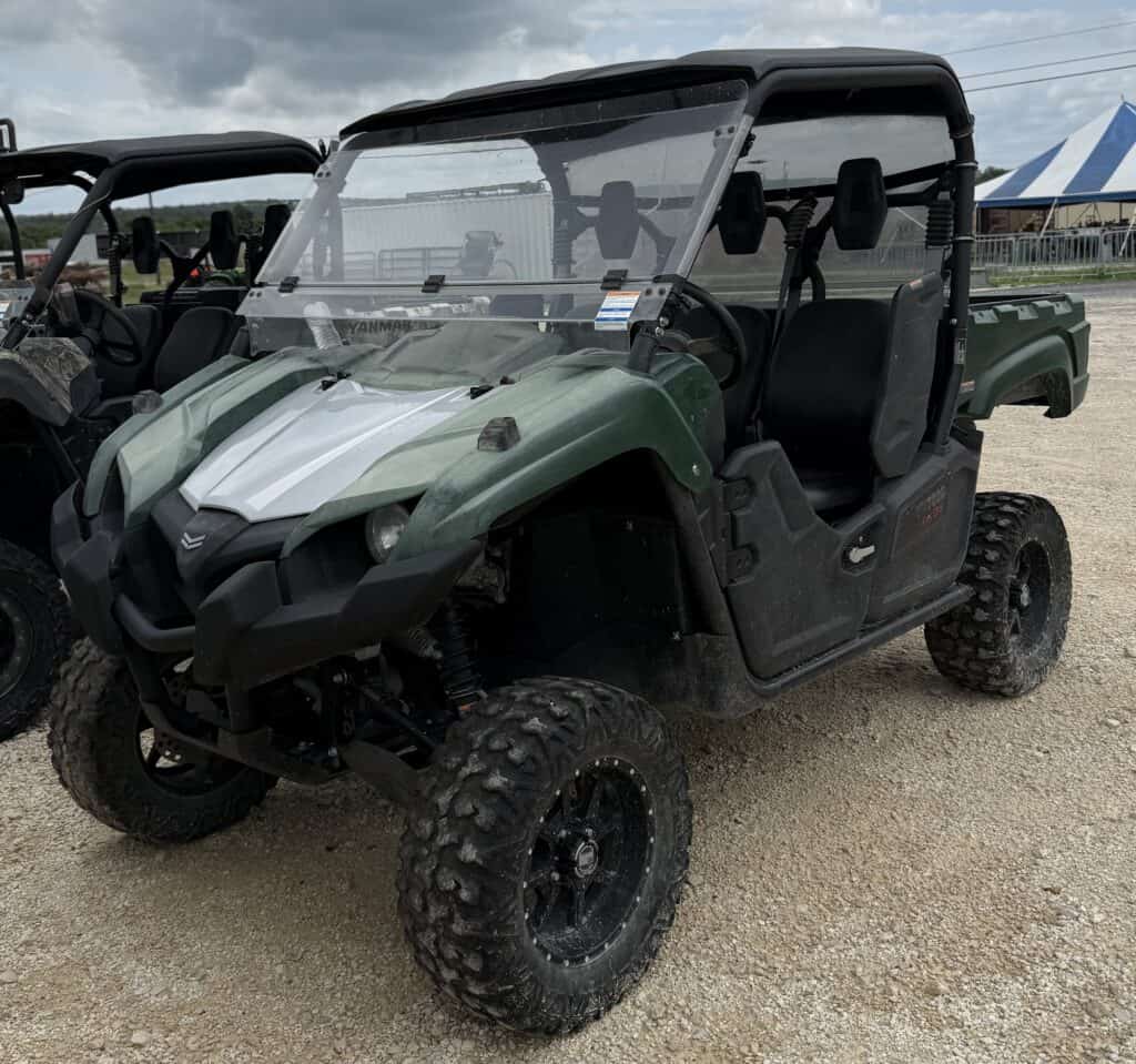 ATV for sale at Garrett Realty & Auction, perfect for outdoor adventures and utility work.