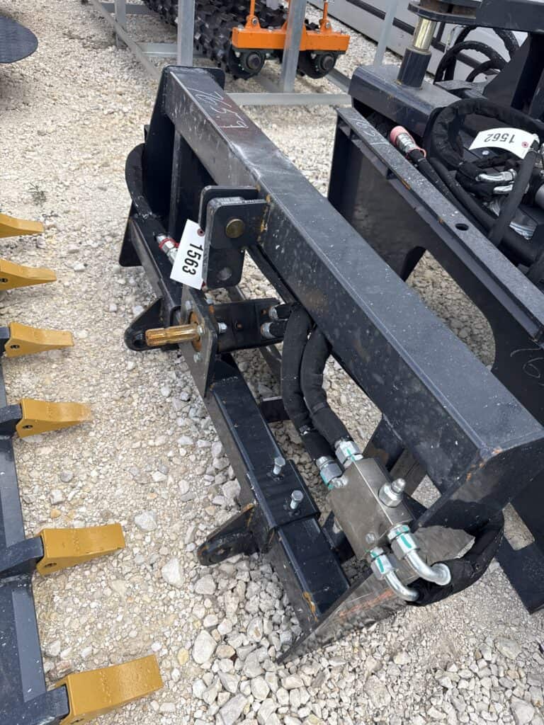 Hydraulic attachment for construction equipment at auction.