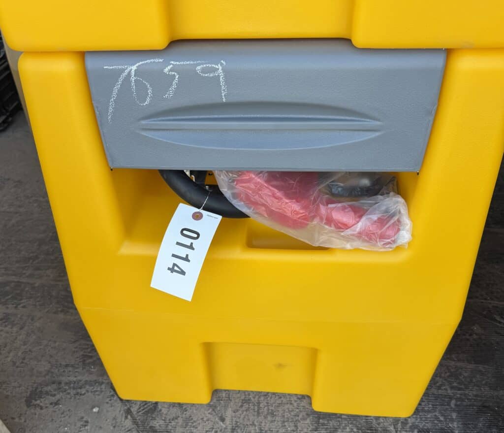 Yellow storage container with gray lid and red plastic bag inside.