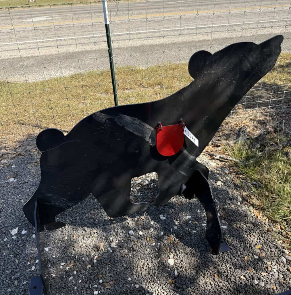 Black bear silhouette sculpture at Garrett Realty & Auction.