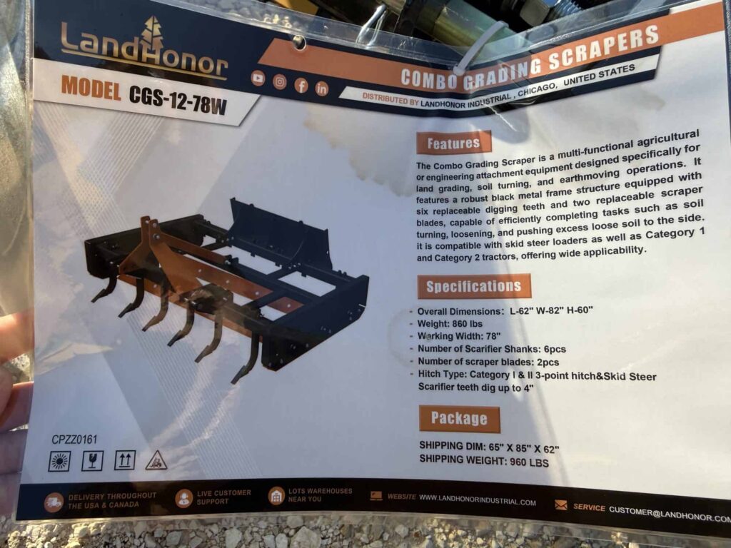 Land Leveler attachment for tractor at auction.