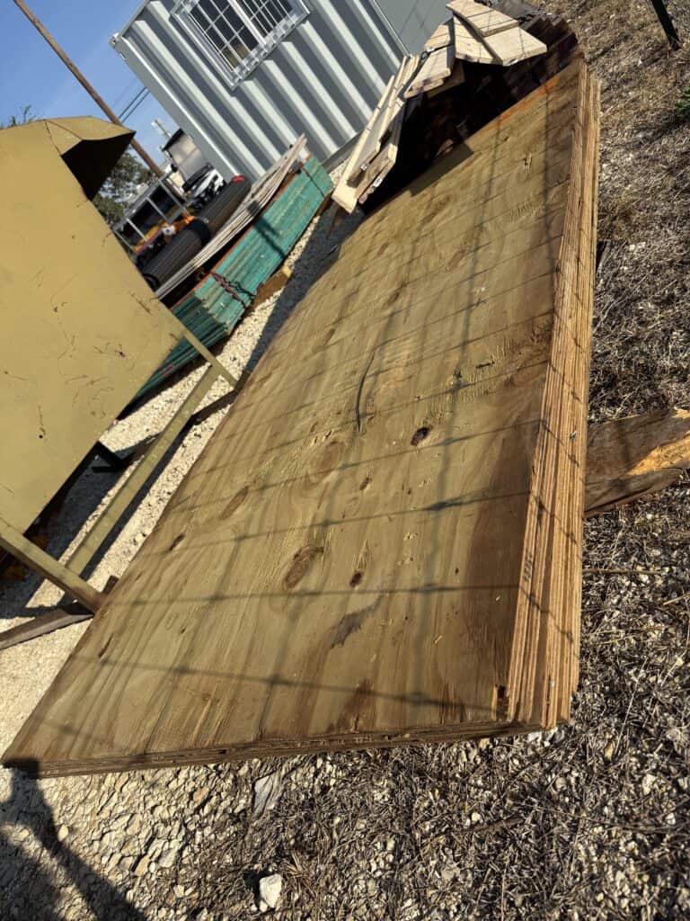 Sturdy wooden table at Garrett Realty & Auction event.