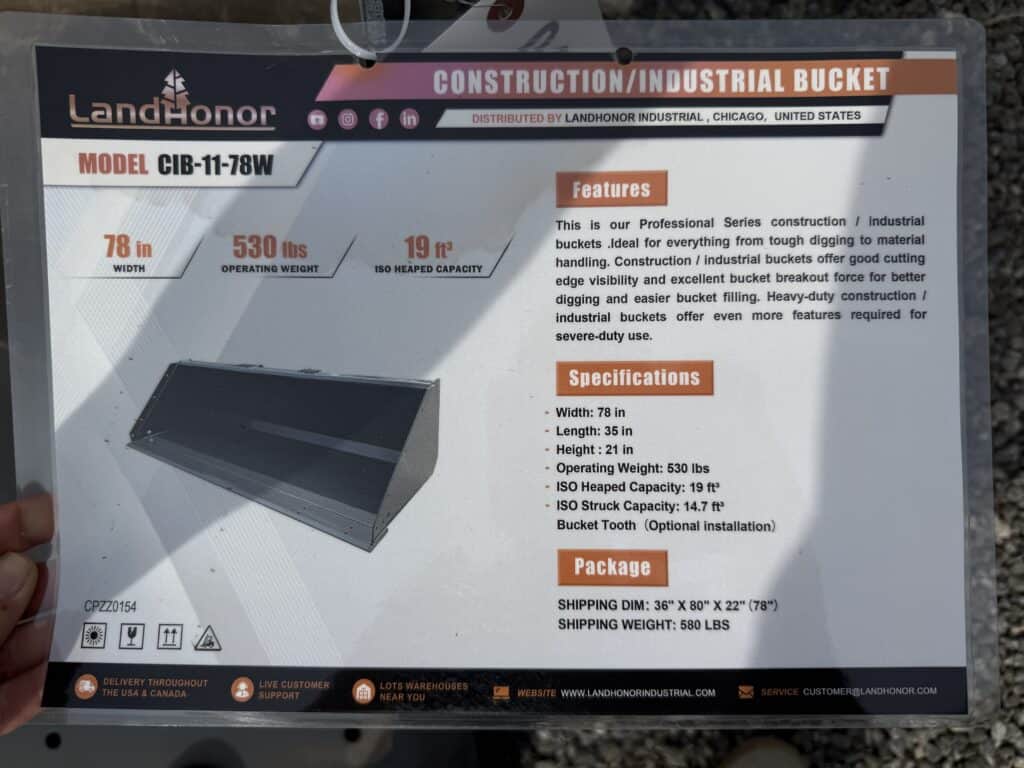 Heavy-duty construction bucket with 78-inch width and 530 lbs capacity.
