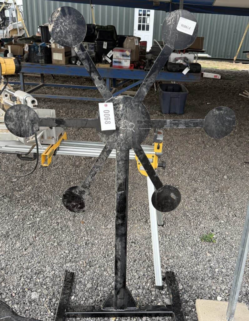 Large metal weather vane with multiple directional arrows for sale.