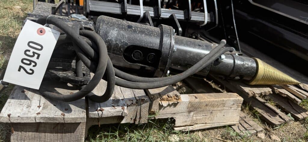 Construction hydraulic breaker attachment for sale at October 10th auction.