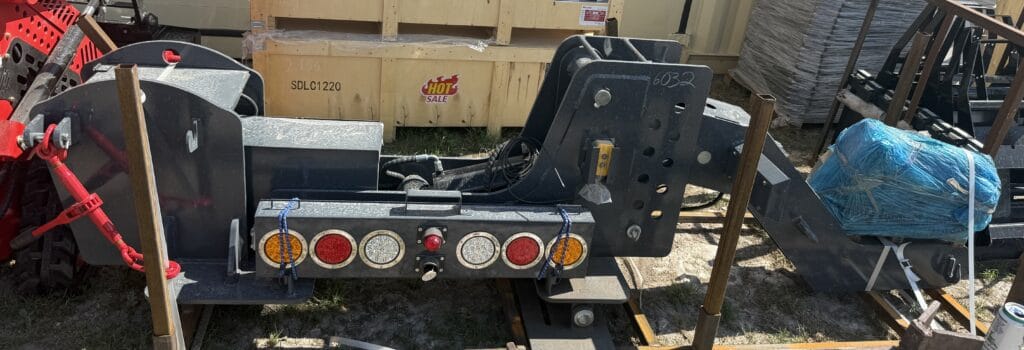 Heavy-duty equipment trailer at Garrett Realty & Auction.