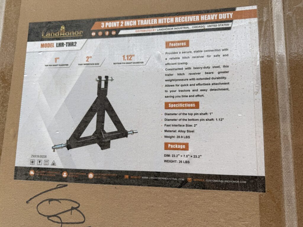 Heavy-duty lawn equipment part for auction at Garrett Realty & Auction.