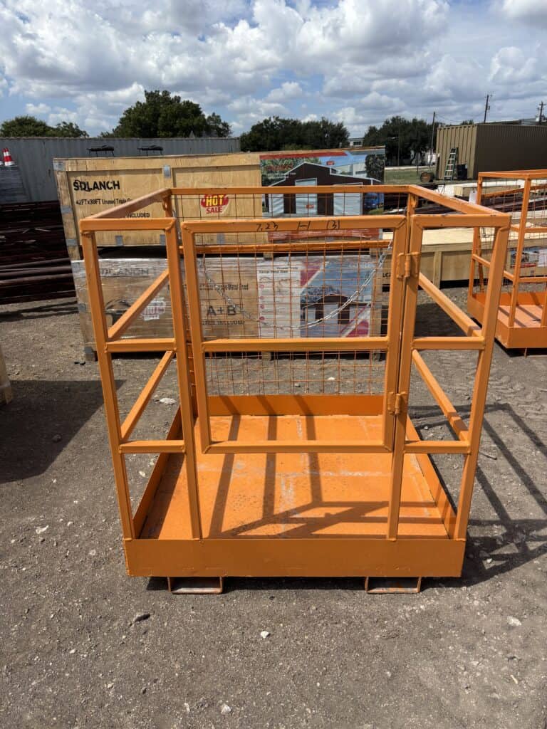 Orange scissor lift platform at October 10th consignment auction.