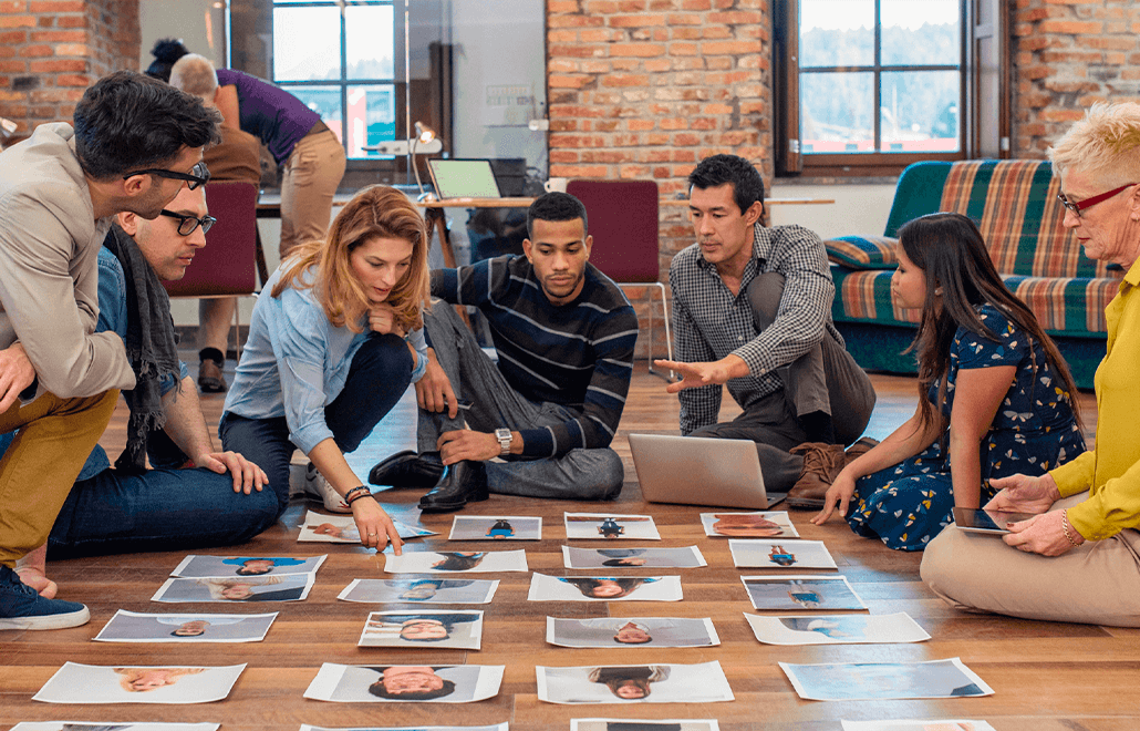 A collaborative team exploring effective marketing strategies to maximize ROI.