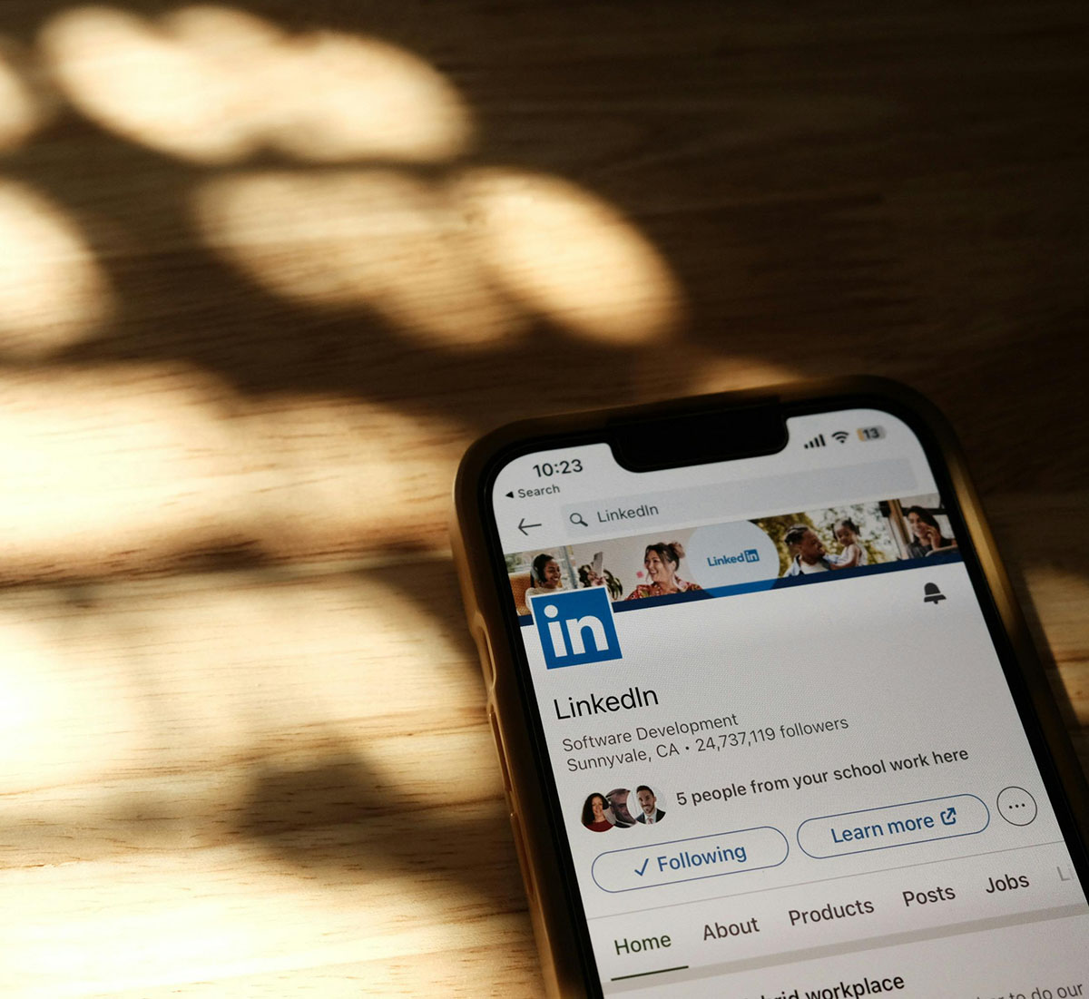 A smartphone displaying a LinkedIn profile.