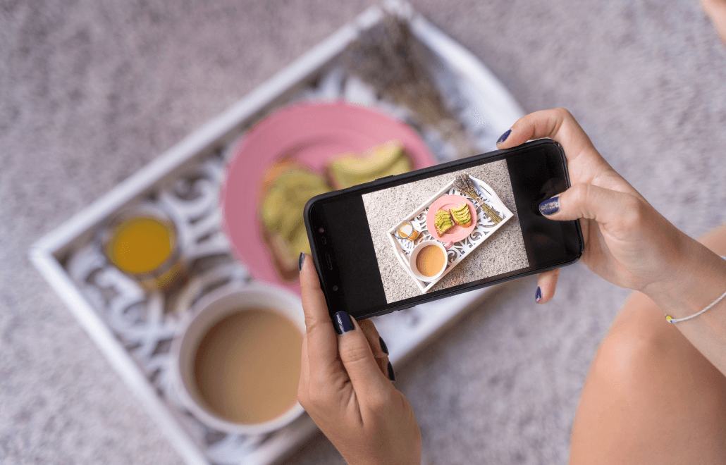 A food photographer capturing images for a website refresh, focusing on high-quality visuals to enhance the online presence.