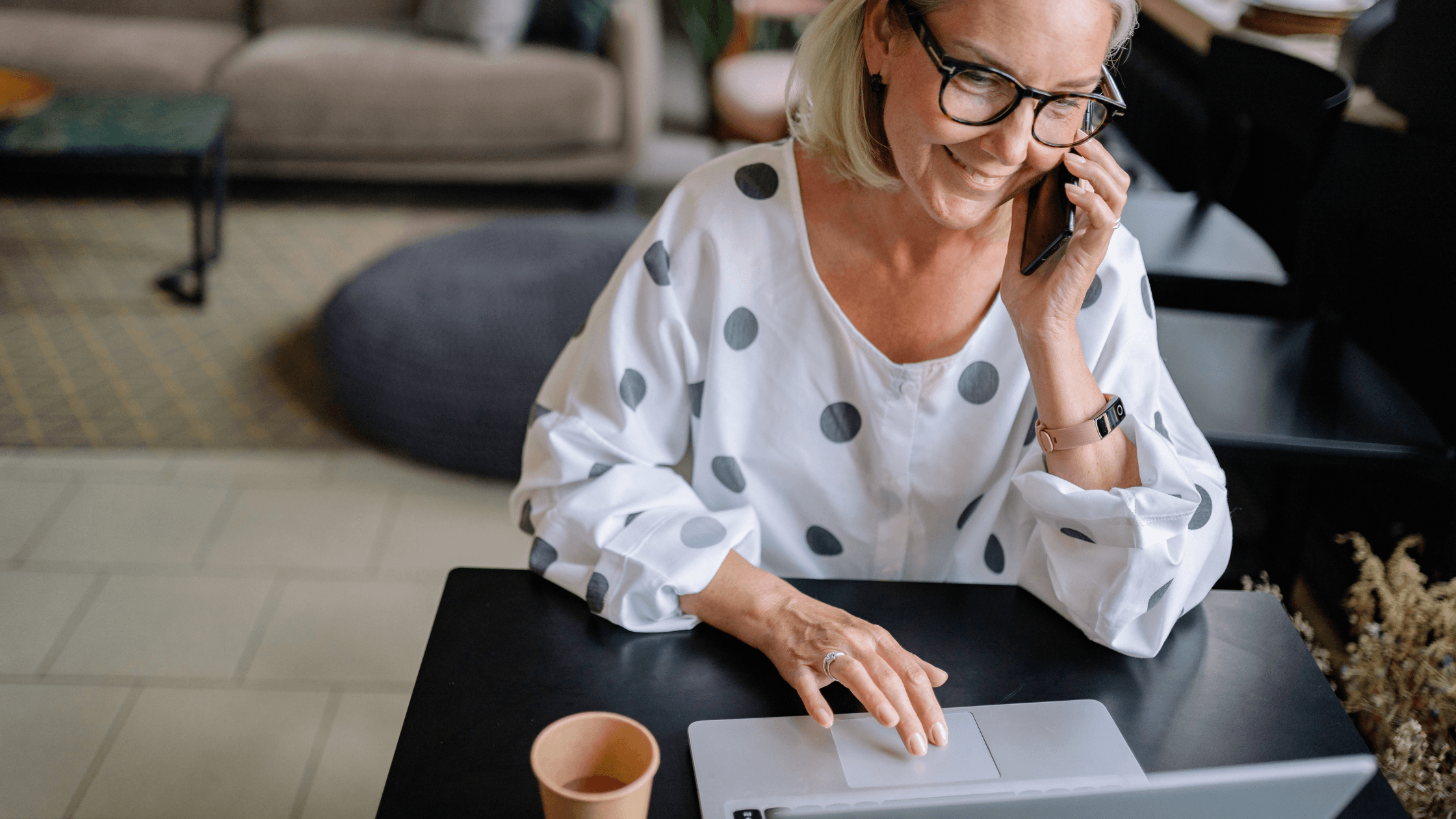 A successful business owner managing her online presence for Life In Motion Marketing