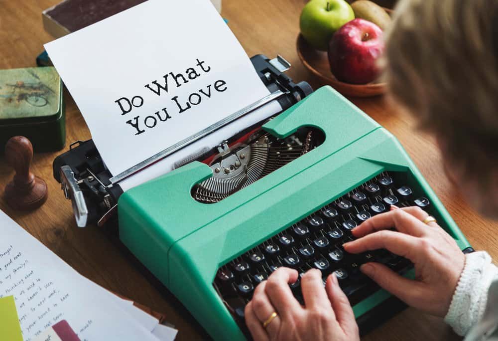 In a workspace as cluttered as the Unseen University&rsquo;s library, someone rattles away at a green typewriter: &ldquo;Do What You Love.&rdquo;.